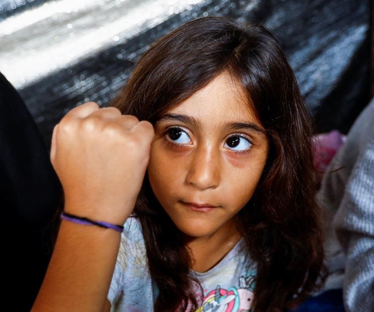 Familias en Gaza usan brazaletes para ser ubicados al morir